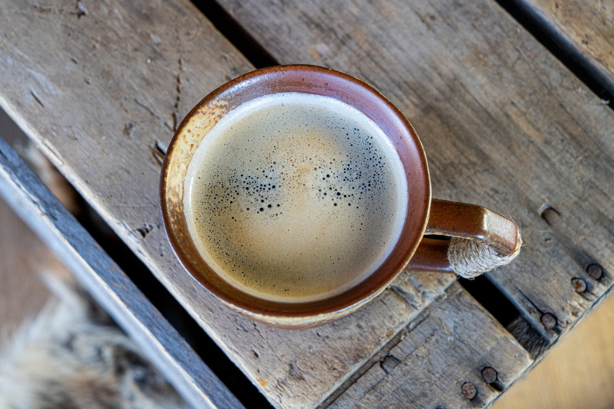 Rustic Handmade Ceramic Coffee Mug – Textured Stoneware with Earthy Glaze & Wrapped Handle